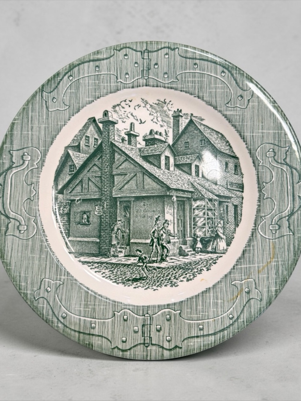 Vintage dinner plate “The Old Curiosity Shop” 10” across by Royal USA